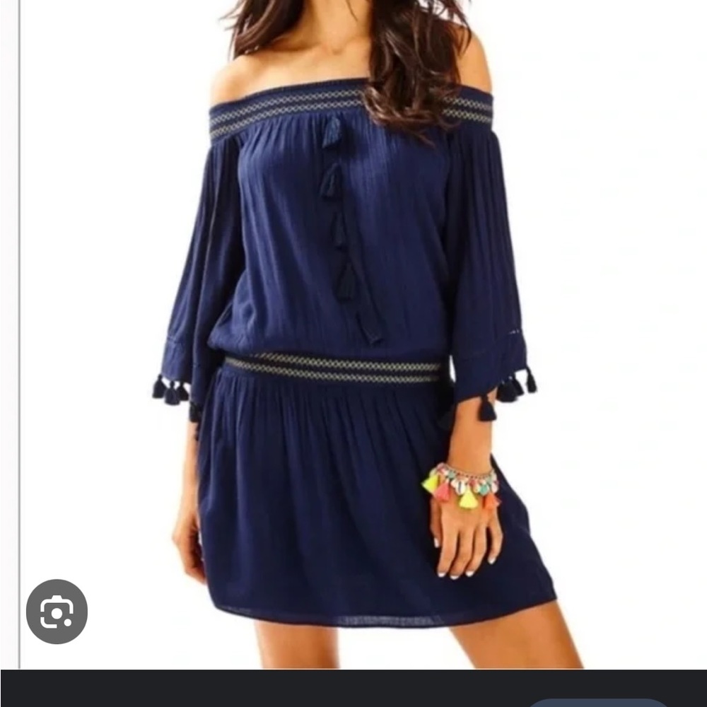 Lilly off the shoulder navy dress
Like new